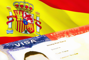 Fila de imigrantes na Câmara Municipal de Barcelona · AP, Abril 2026